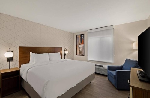 Brownsville Hotel | One Suite w/King Size Bed | Kitchenette | Gym Access | Free Parking