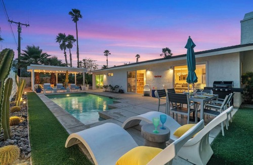 Desert Park Estates House | Palm Paradise offers a private 3BR retreat with a saltwater pool, fire pit, BBQ, and mountain views. Just minutes from downtown, this stylish getaway is perfect for families or friends seeking relaxation and Palm Springs charm.