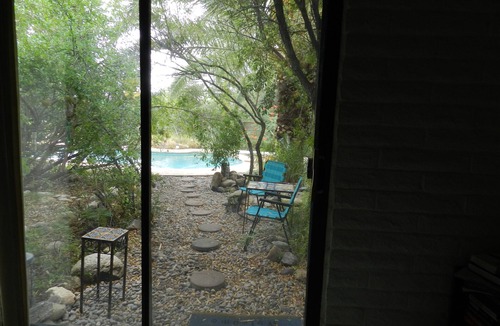 Rancho Feliz House | Palm trees, pool in Northwest Tucson next to Catalina mountains, Southwest shops