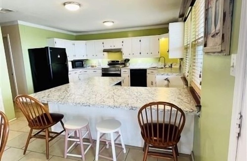 Port Mansfield House | Peace & Paradise. 4 Bedroom, 4 Bath. 9 Beds. Sleeps 14. Private Fishing Pier.