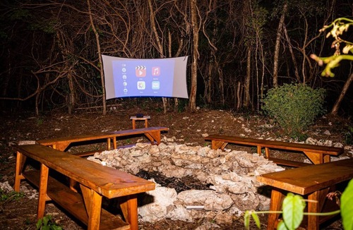 Akumal Cabin | Peaceful Getaway in the Jungle with AC and private deck with Hot Tub.