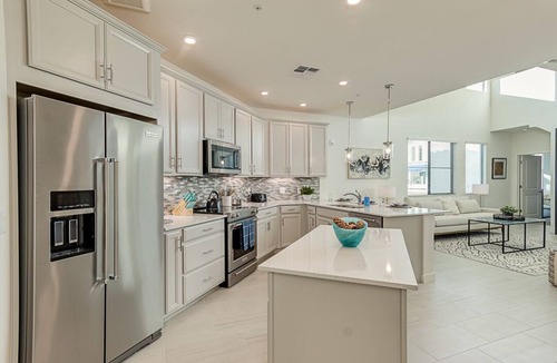 Carino Estates Condo | Penthouse Two Story Resort Condo in Ocotillo! Waterviews at The Cays!