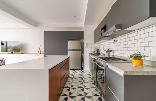 Americana Condo | Penthouse with private rooftop and panoramic views