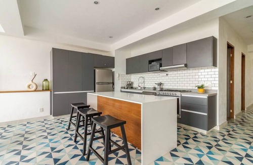 Americana Condo | Penthouse with private rooftop and panoramic views