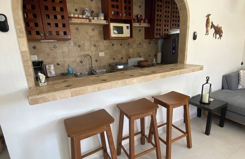 Puerto Morelos Condo | PlayaSol Beachfront Condo with large pool, steps to beach, walk to town square