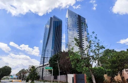 Financial District Apartment | Pool & gym retreat near Bosque Los Colomos