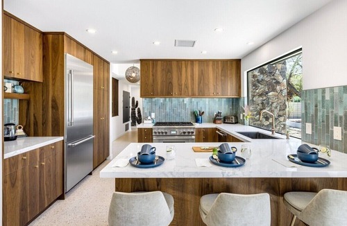 Araby Commons House | Poolside Mid-Century Paradise - Luxury Meets History: Iconic Architecture & Resort-Style Comfort