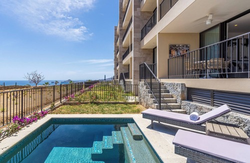 El Tezal Condo | Private and heated pool with arch view new condo!