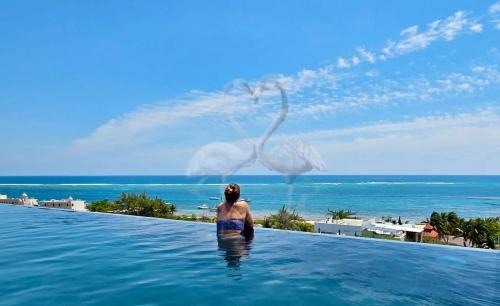Puerto Morelos Apartment | Private Suite, Walk to the Beach, Oceanview Rooftop Pool, WiFi StarLink