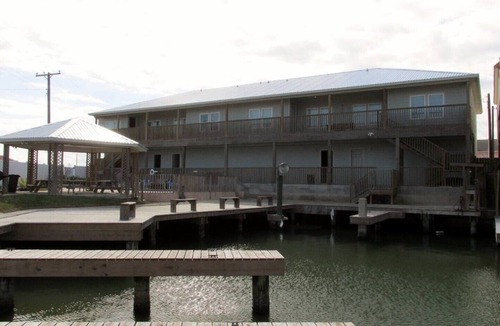 Port Mansfield Condo | Red Fish Condo B, with boat slips and pool.