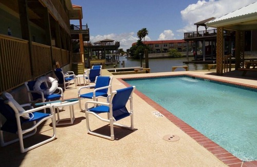 Port Mansfield Condo | Red Fish Condo B, with boat slips and pool.