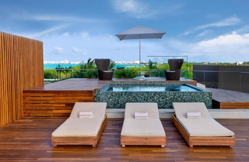 Downtown Cancun Hotel | Refreshing Getaway with Scenic Pool and Beach Access | 1 BR Oceanfront Stay