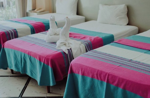 Merida Hotel | Relax at a Poolside Hotel in Mérida’s Centro District Near Dining & Local Market