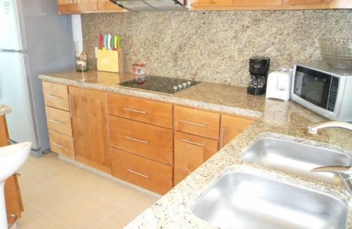 Colina del Sol Condo | Relax in our Condo With Spectacular Ocean, City and Mountain View.
