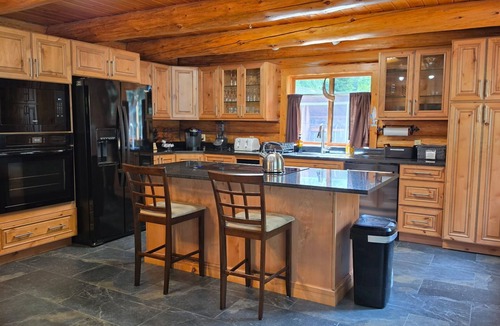 Libby House | Riverfront Log Home in Libby, Montana on the Kootenai River.