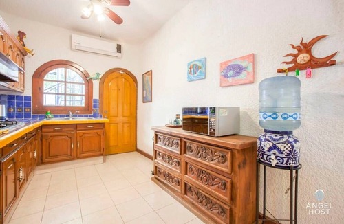 Lomas de Palmira Apartment | Rooftop Views & Sunsets, Steps to the Malecón