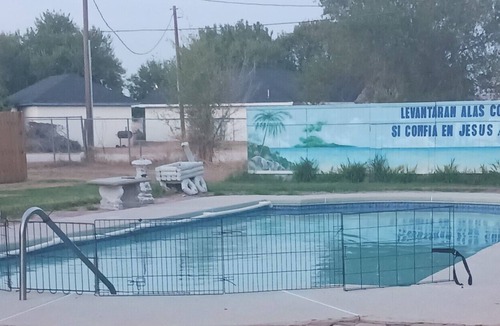 Donna House | Room available. Relax in the pool after a long hard, hot day; bring the family.