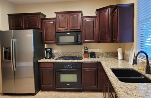 Higley Park House | Spacious 3 Bedroom Home In Beautiful Higley Park - Patio with Endless Pool