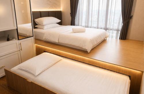 Kesawan Apartment | Spacious Modern 2BR at The Reiz Suites City Center