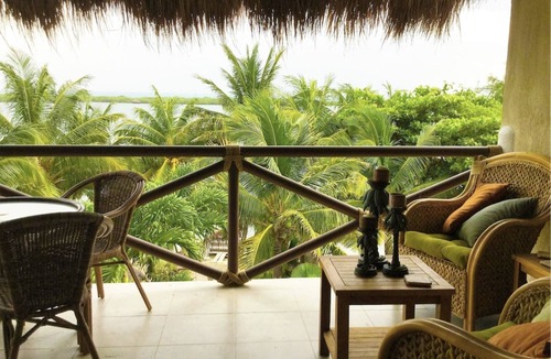 Isla Mujeres Villa | Spend the day at the Soggy Peso Palapa Bar, and spend the night in The Penthouse