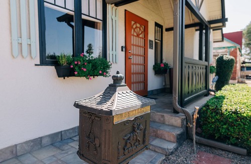 Del Norte Place House | Storybook Perfect Historic Cottage Near Downtown