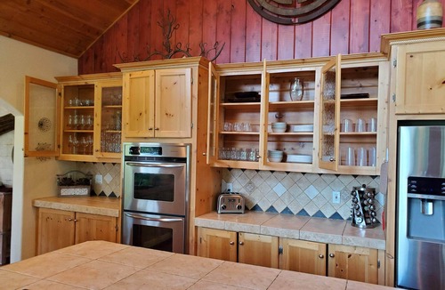 Comeback Bay House | Striking LAKEFRONT home w/hot tub, dock, highspeed WIFI & week/month discounts