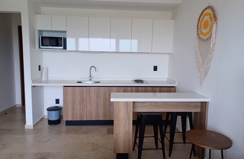 Ejidal Apartment | Studio in Centro Maya area of Playa Del Carmen-full kitchen, AC, smart TV, pool.