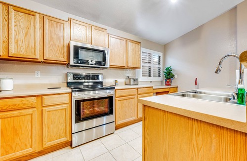Suncliff House | Stunning home with pool, patio, grill, central AC & washer/dryer