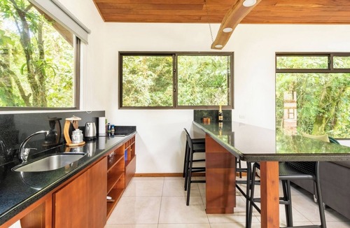 Quebrada Grande Apartment | Sunset Views Over the Cloud Forest Steps from Zip Lines, Farm & Wine