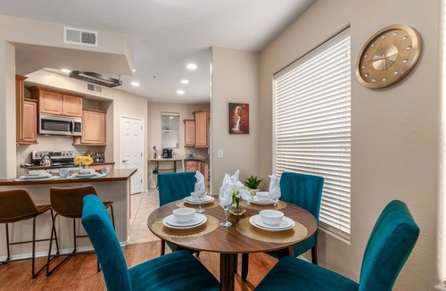 Park Place Condo | Surprise Ground Floor Condo with 2 Private Courtyards! Heated Community Pool!