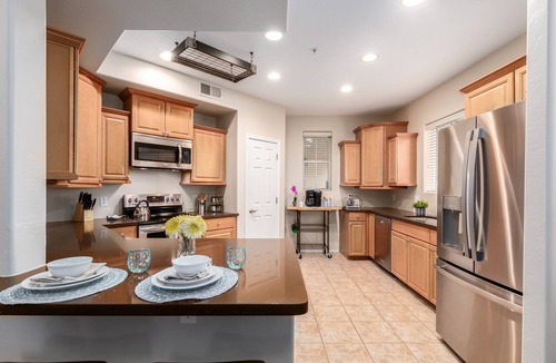 Park Place Condo | Surprise Ground Floor Condo with 2 Private Courtyards! Heated Community Pool!