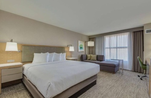 Chandler Hotel | Sustainable Comfort: Heated Pool, On-Site Dining & Easy Access to I‑10