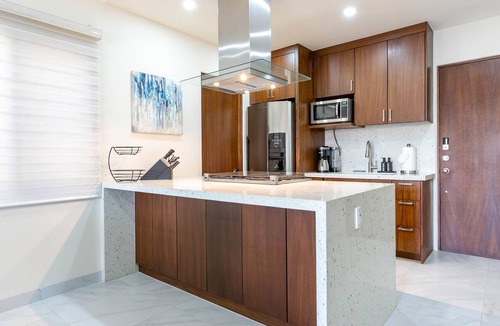 Libertad Condo | This brand-new 2-bedroom, 2-bath condo offers modern comfort with a stylish open layout and fully equipped kitchen. Enjoy a private rooftop terrace with outdoor kitchen and panoramic views—perfect for relaxing and taking in the beauty of Vista Mare.