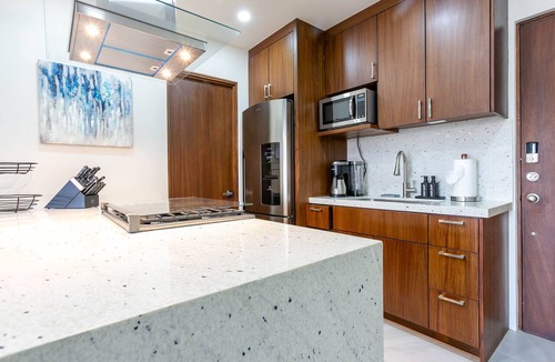 Libertad Condo | This brand-new 2-bedroom, 2-bath condo offers modern comfort with a stylish open layout and fully equipped kitchen. Enjoy a private rooftop terrace with outdoor kitchen and panoramic views—perfect for relaxing and taking in the beauty of Vista Mare.