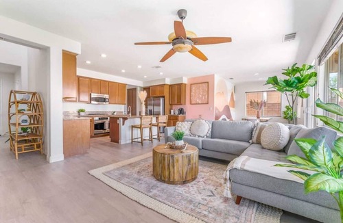 Terra Lago House | This spacious Indio home is designed for families, golf trips, festival weekends, and guests who want built-in entertainment. Enjoy a private saltwater pool, free spa, golf simulator, poolside cinema, game room, glamping yurt, hammocks, and karaoke.