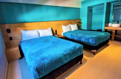 Zona Dorada Hotel | Trendy Shoreline Warm Room Just Moments from Waves, Food & Fun