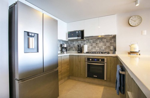 Las Glorias Condo | Upscale Corner Unit w/Large Wrap Around Balcony & Pools