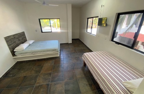 Los Ayala House | Very comfortable suite with 1 QS + 1 twin bed, AC. Only 2 blocks from beach.
