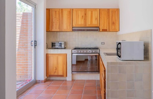 Esterito Condo | Walk to Malecon, Sunset Rooftop & Work Space