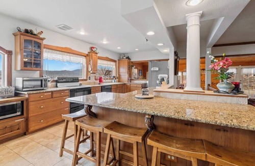 Hauser House | Waterfront home sleeps 21 with dock and game room