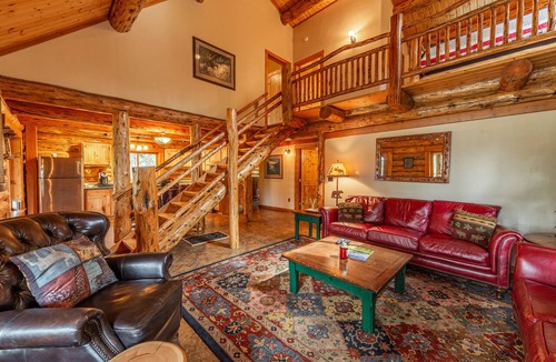 Lake Mary Ronan Cabin | Wayne Manor-Cozy Cabin in the Woods Lake Views