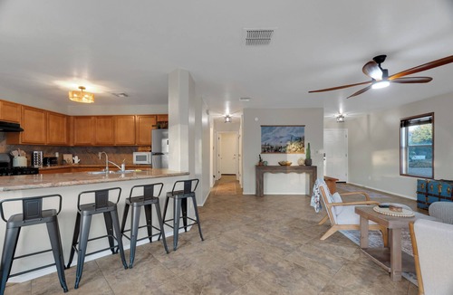 Green Valley House | Welcome to Cactus Retreat—a modern 5BR/3BA getaway featuring a private pool, fire pit, grill, and dedicated office. Unwind in a comfortable king-bed primary suite and enjoy spacious living for families and groups. Pet‑friendly.