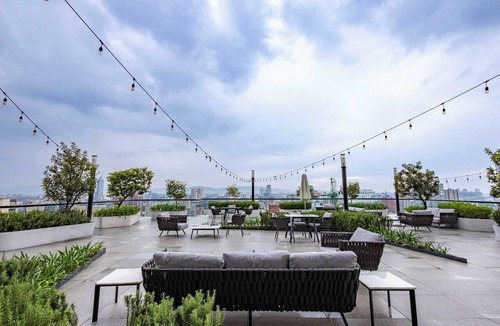 Zona Minerva Apartment | Where Comfort Meets the Skyline