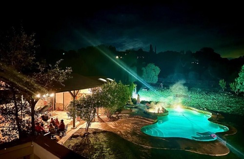 Mira Monte House | Winnebago camper set up on beautiful property with resort style pool and jacuzzi
