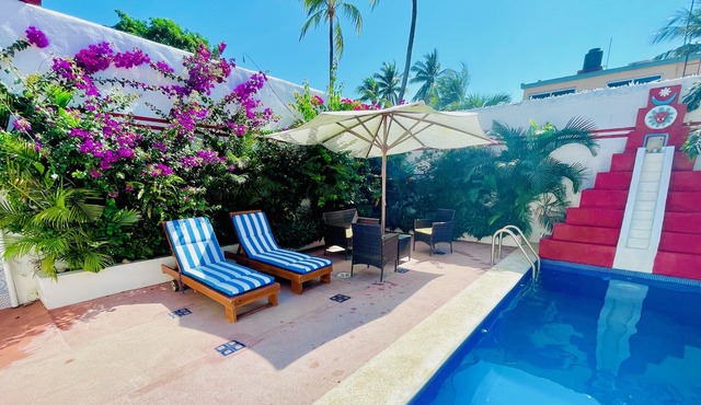 2 bed, 2 bath house w/private pool, pyramid waterfall, short walk to beach.