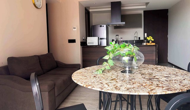2BR skyline retreat w/rooftop pool access