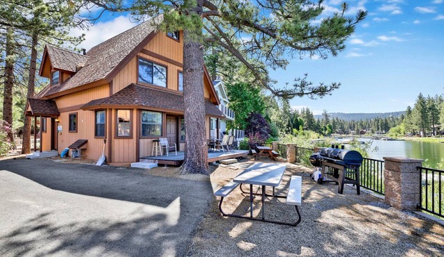 7BR/6.5BA Lakefront Estate: Private Boat Dock, Wood Fireplace & Village Access