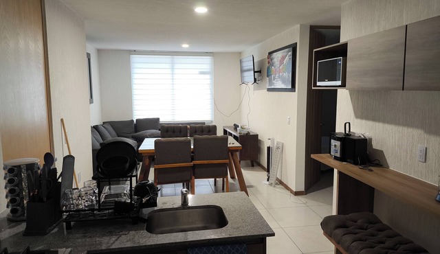 Apartment in condominium with pool