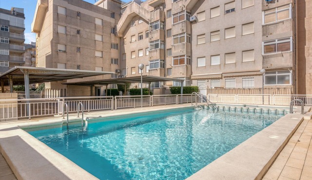 Apartment 'On Daimús Beach' with Shared Pool, Wi-Fi and Air Conditioning