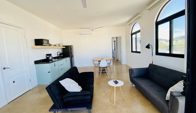 Apartment with mountain view, private balcony and access to beach front terrace.